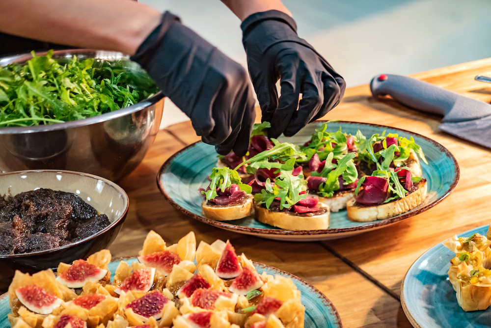 Growing Catering Sales - Photo of Chef putting an appetizer together